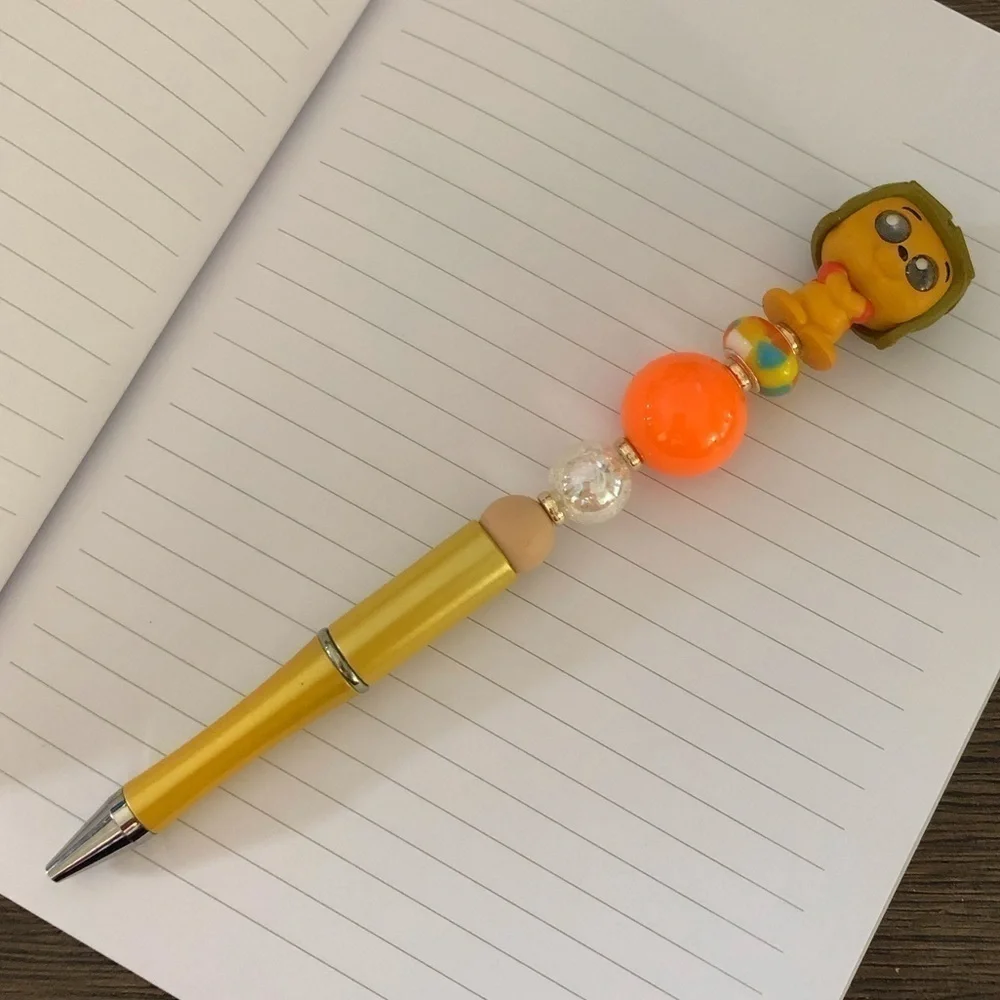 Disney doorables: Winnie the Pooh handmade beaded pen